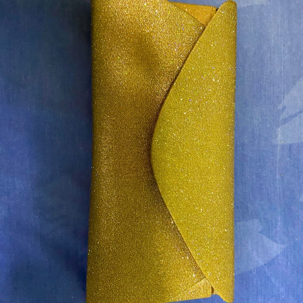 Gold shimmery clutch